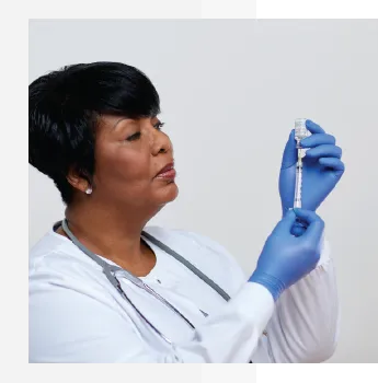 Image of physician preparing CIMZIA injection