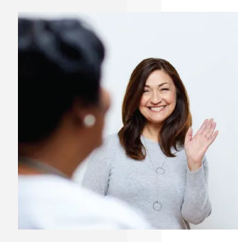 Image of woman waving